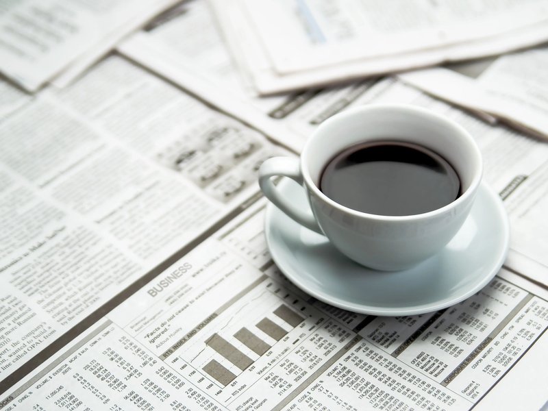 Coffee on newspapers in Howard Carpenter Floor Covering in Danville KY