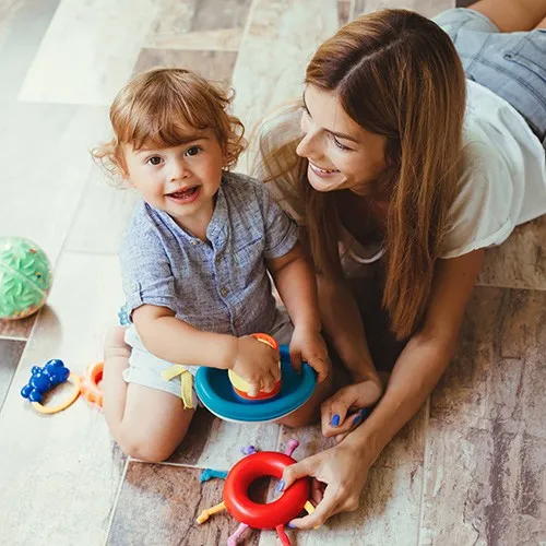 After-TileFlooring-InstallationDay Happy mom with child | Howard-Carpenter Floor Covering